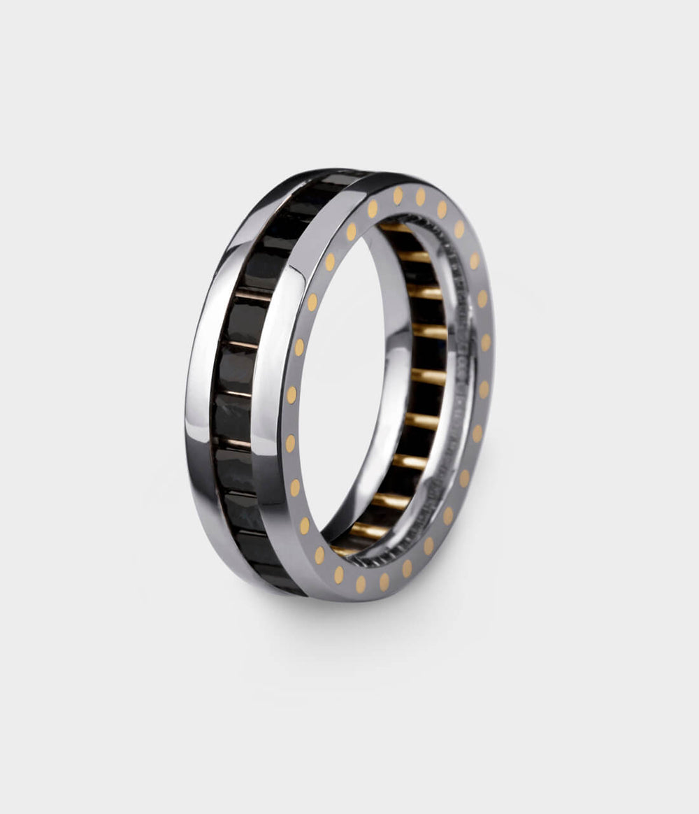 3/4 view of a geo ellipse eternity ring in platinum and black sapphires